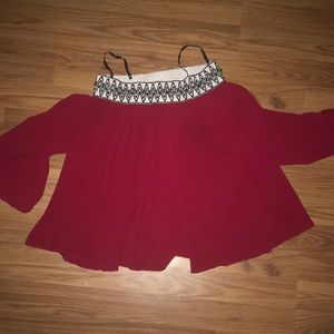 Red off the shoulder shirt
